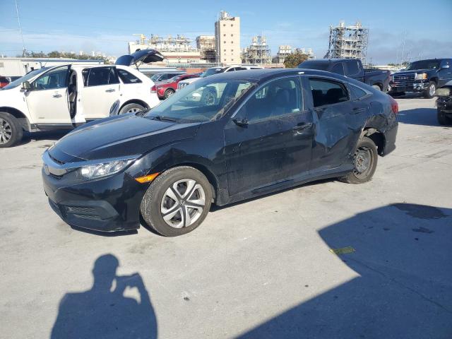 HONDA CIVIC LX 2018 with VIN 19XFC2F54JE026450 - Photo from auction