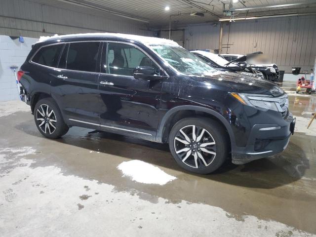 Photo 4 from auction – 2021 HONDA PILOT ELIT with VIN 5FNYF6H05MB005324