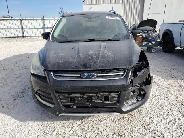 Photo 5 from auction – 2014 FORD ESCAPE TIT with VIN 1FMCU0J98EUE21071