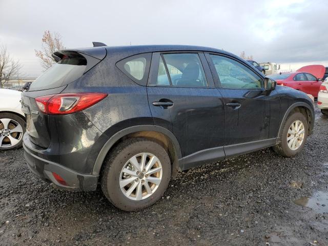 Photo 3 from auction – 2013 MAZDA CX-5 SPORT with VIN JM3KE2BE0D0104449