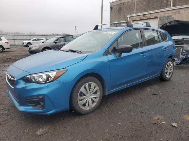 SUBARU IMPREZA 2019 with VIN 4S3GTAA67K3726969 - Photo from auction