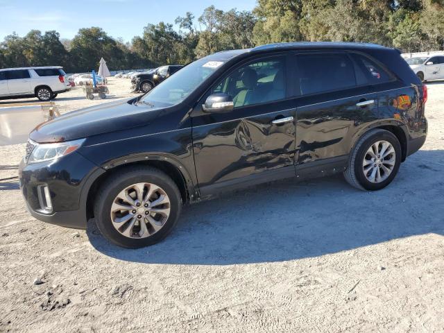 KIA SORENTO EX 2014 with VIN 5XYKU4A75EG461390 - Photo from auction