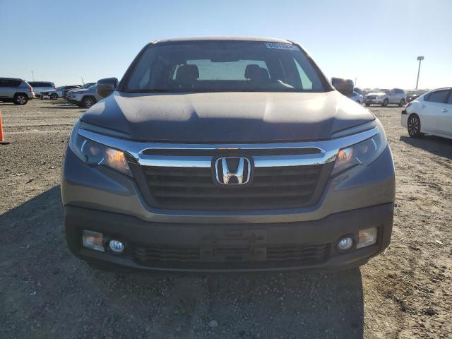 Photo 5 from auction – 2017 HONDA RIDGELINE with VIN 5FPYK2F48HB007351