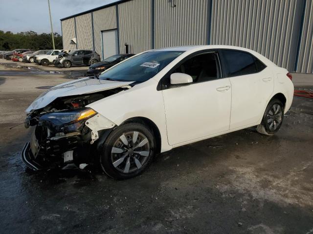TOYOTA COROLLA L 2019 with VIN 5YFBURHE1KP881303 - Photo from auction