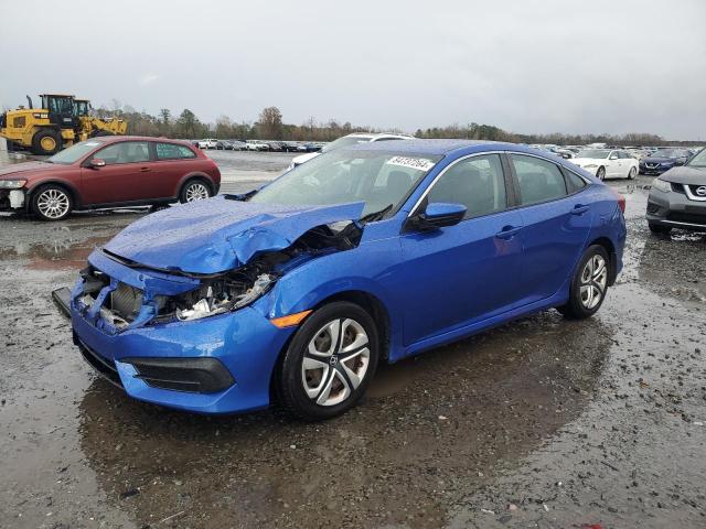 HONDA CIVIC LX 2018 with VIN 19XFC2E51JE001572 - Photo from auction