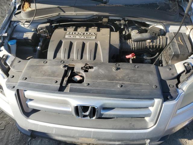 Photo 12 from auction – 2006 HONDA PILOT EX with VIN 2HKYF18786H544413