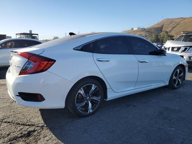 Photo 3 from auction – 2016 HONDA CIVIC LX with VIN 19XFC2F50GE214035