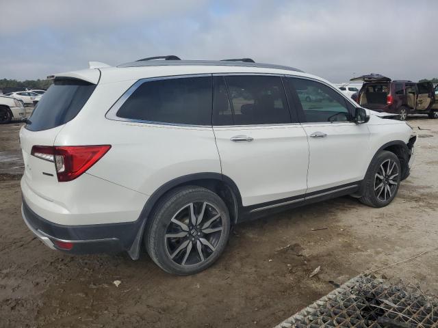 Photo 3 from auction – 2021 HONDA PILOT TOUR with VIN 5FNYF5H63MB017549