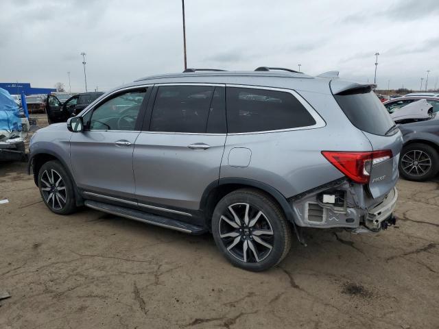 Photo 2 from auction – 2021 HONDA PILOT ELIT with VIN 5FNYF6H02MB018080