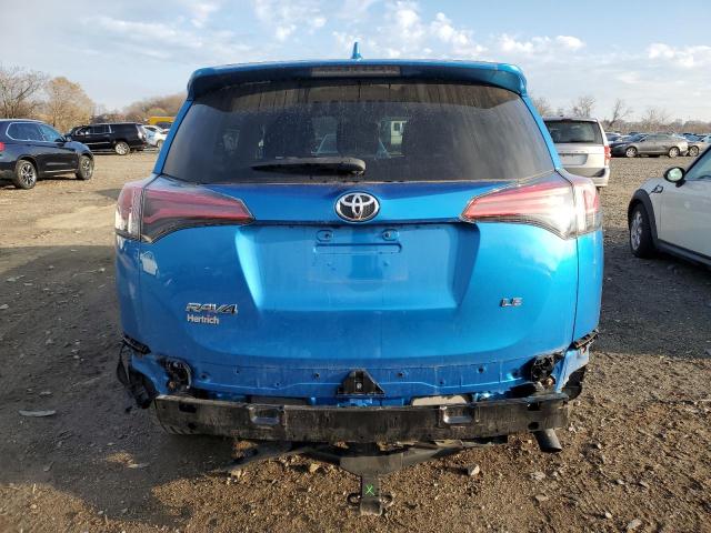 Photo 6 from auction – 2018 TOYOTA RAV4 LE with VIN 2T3ZFREV8JW490442