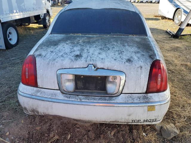 Photo 10 from auction – 2000 LINCOLN TOWN CAR E with VIN 1L1FM81W2YY852957