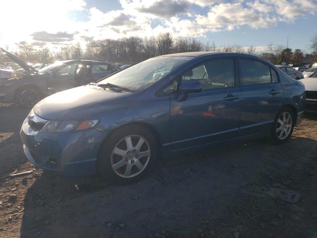 HONDA CIVIC LX 2011 with VIN 2HGFA1F53BH524792 - Photo from auction