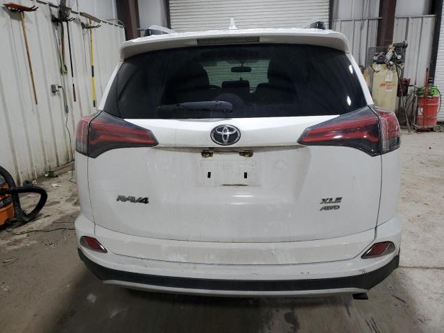 Photo 6 from auction – 2016 TOYOTA RAV4 XLE with VIN 2T3RFREV4GW534736