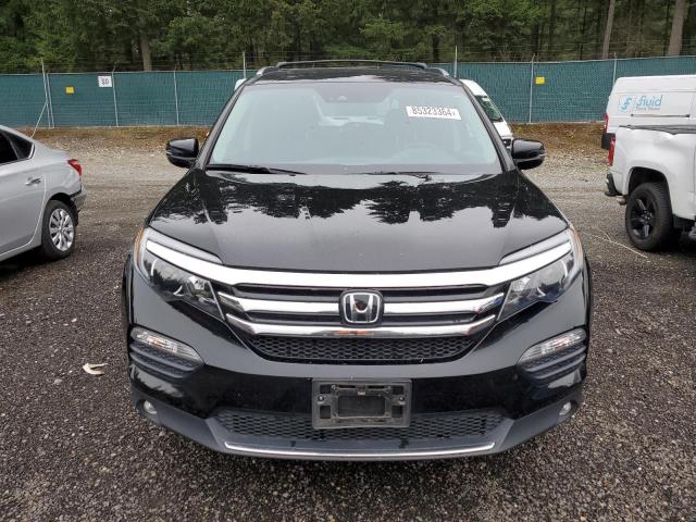 Photo 5 from auction – 2018 HONDA PILOT ELIT with VIN 5FNYF6H00JB011950