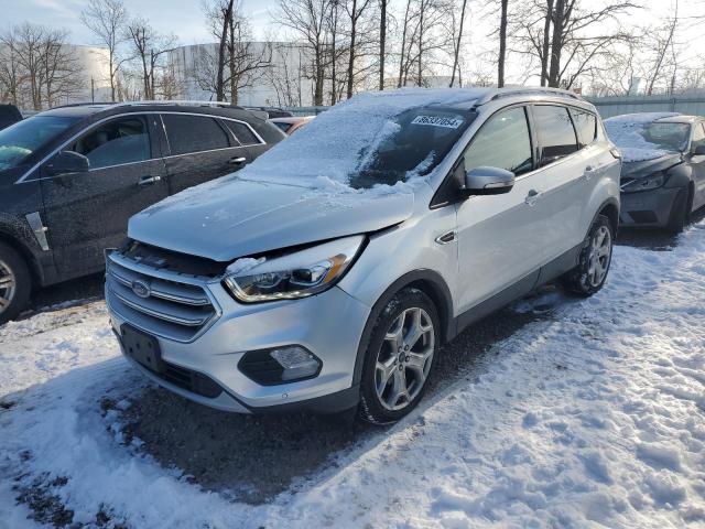 FORD ESCAPE TIT 2017 with VIN 1FMCU9J99HUD53923 - Photo from auction