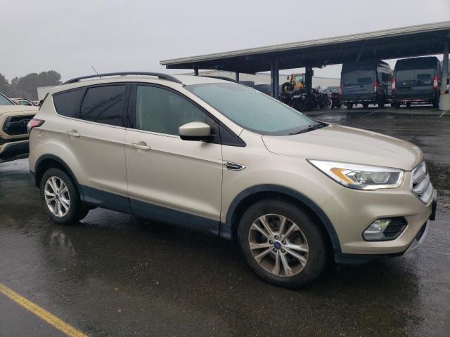 Photo 4 from auction – 2017 FORD ESCAPE SE with VIN 1FMCU9GD7HUC86587