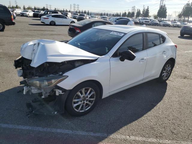 MAZDA 3 GRAND TO 2014 with VIN JM1BM1M77E1189015 - Photo from auction