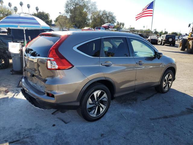 Photo 3 from auction – 2015 HONDA CR-V TOURI with VIN 5J6RM3H97FL025978