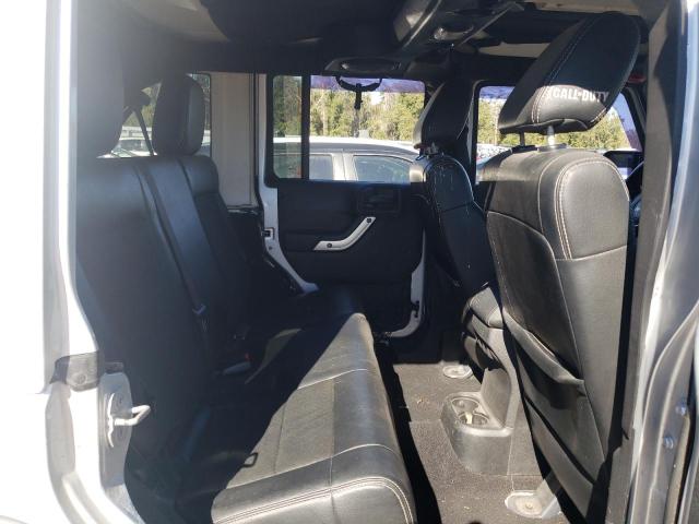 Photo 11 from auction – 2012 JEEP WRANGLER U with VIN 1C4BJWFG3CL228073