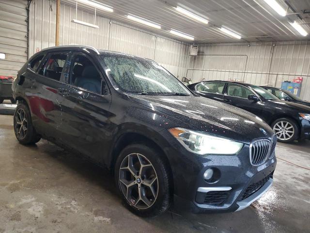 Photo 4 from auction – 2018 BMW X1 XDRIVE2 with VIN WBXHT3C35J5L28605