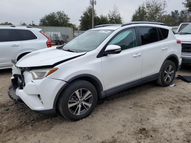 TOYOTA RAV4 XLE 2017 with VIN 2T3WFREV6HW398209 - Photo from auction