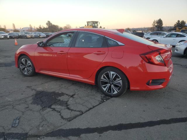 Photo 2 from auction – 2016 HONDA CIVIC EX with VIN 2HGFC1F35GH632959