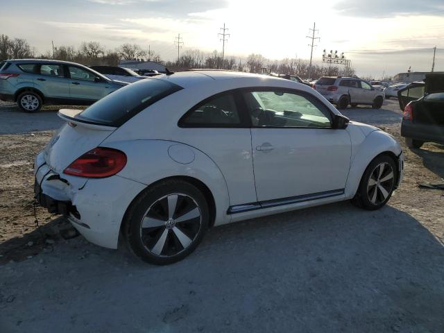 Photo 3 from auction – 2013 VOLKSWAGEN BEETLE TUR with VIN 3VWVA7AT5DM654903