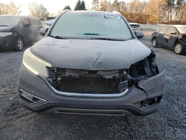Photo 5 from auction – 2016 HONDA CR-V EXL with VIN 2HKRM3H70GH540752