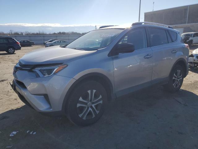 TOYOTA RAV4 LE 2016 with VIN 2T3BFREV5GW498850 - Photo from auction