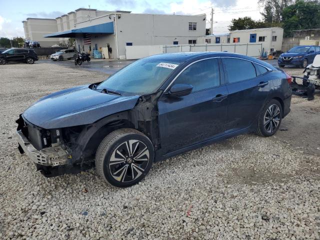 HONDA CIVIC EXL 2016 with VIN 19XFC1F79GE009051 - Photo from auction