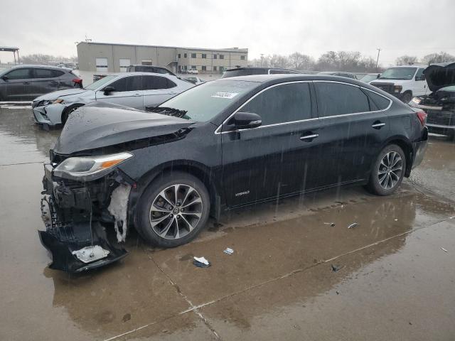 TOYOTA AVALON HYB 2016 with VIN 4T1BD1EB7GU055007 - Photo from auction