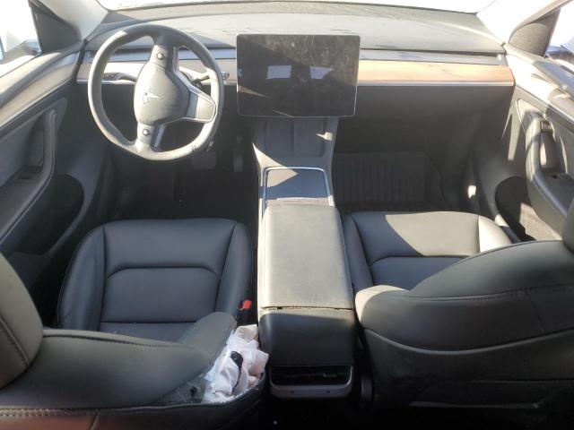 Снимка 8 от търг – 2023 TESLA MODEL Y с VIN 7SAYGDEE9PA044407