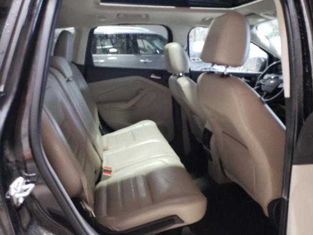 Photo 11 from auction – 2017 FORD ESCAPE TIT with VIN 1FMCU9J98HUF09384