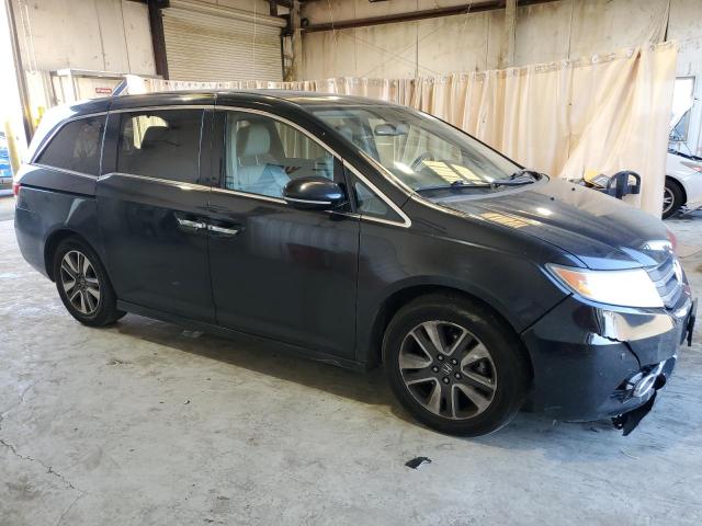 Photo 4 from auction – 2014 HONDA ODYSSEY TO with VIN 5FNRL5H95EB039920