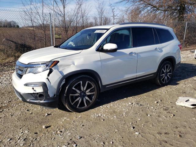 HONDA PILOT TOUR 2019 with VIN 5FNYF6H69KB055791 - Photo from auction