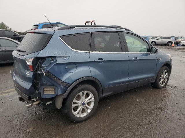 Photo 3 from auction – 2018 FORD ESCAPE SE with VIN 1FMCU0GD3JUC66628
