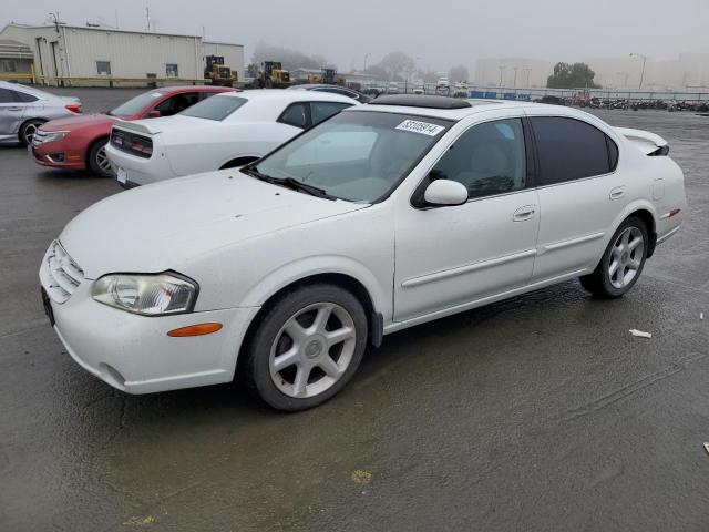 NISSAN MAXIMA GLE 2000 with VIN JN1CA31D7YT527995 - Photo from auction