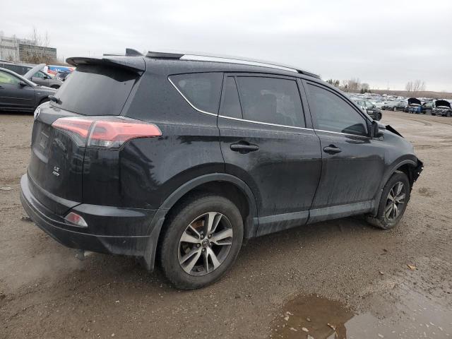 Photo 3 from auction – 2018 TOYOTA RAV4 LE with VIN 2T3BFREV0JW778568