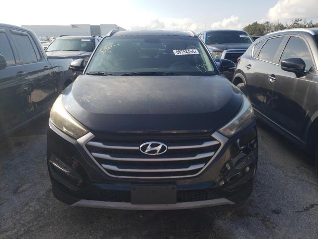 Photo 5 from auction – 2017 HYUNDAI TUCSON LIM with VIN KM8J33A28HU325475
