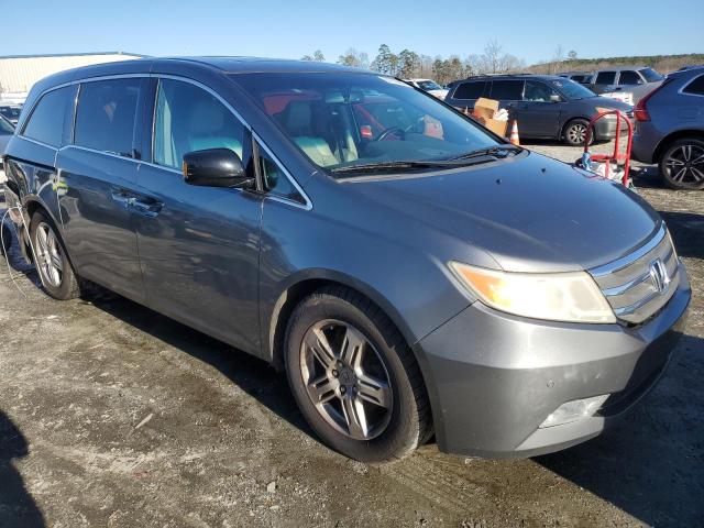 Photo 4 from auction – 2011 HONDA ODYSSEY TO with VIN 5FNRL5H9XBB061858