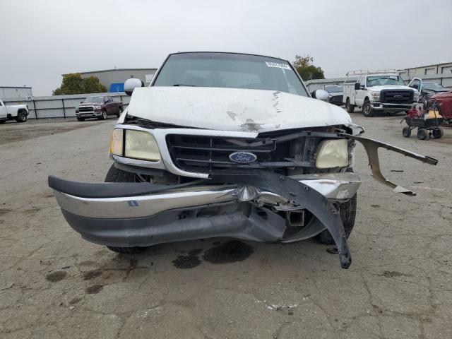 Photo 5 from auction – 2002 FORD F150 SUPER with VIN 1FTRW076X2KB61575