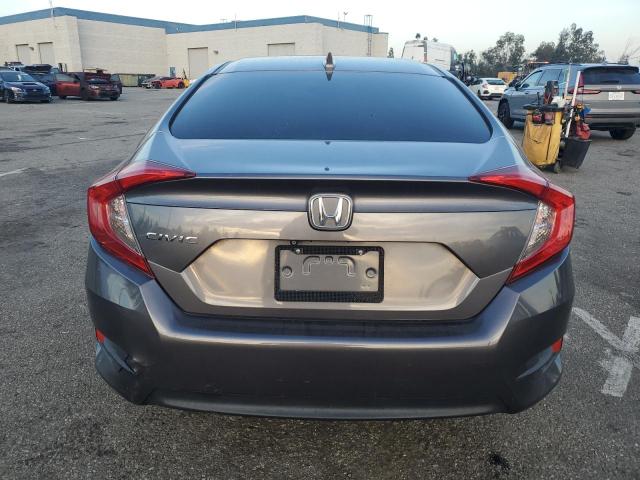 Photo 6 from auction – 2018 HONDA CIVIC EX with VIN 2HGFC2F77JH608534