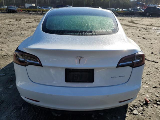 Photo 6 from auction – 2022 TESLA MODEL 3 with VIN 5YJ3E1EB1NF327191