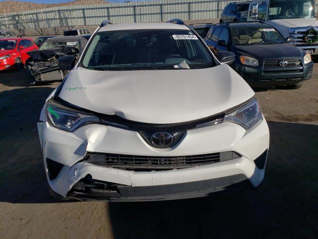 Photo 5 from auction – 2018 TOYOTA RAV4 LE with VIN JTMZFREV1JJ168093