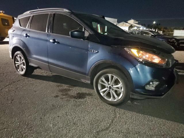 Photo 4 from auction – 2018 FORD ESCAPE SE with VIN 1FMCU0GD0JUC87548