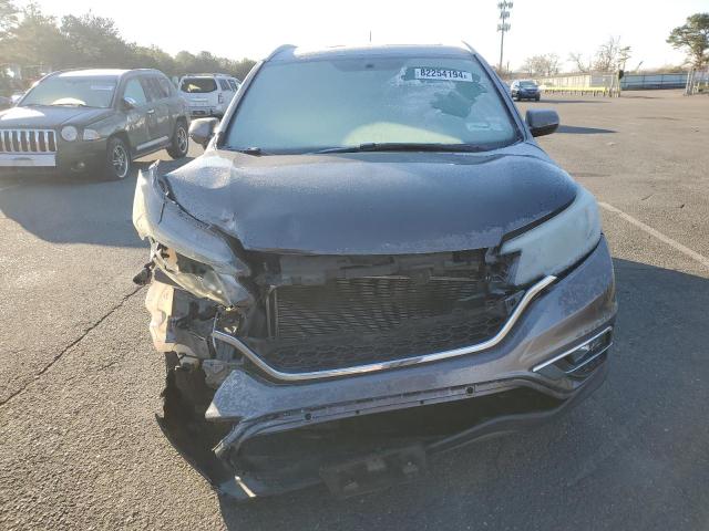 Photo 5 from auction – 2016 HONDA CR-V with VIN 2HKRM4H72GH707697