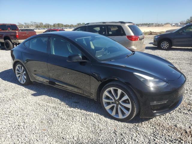 Photo 4 from auction – 2022 TESLA MODEL 3 with VIN 5YJ3E1EA1NF285659