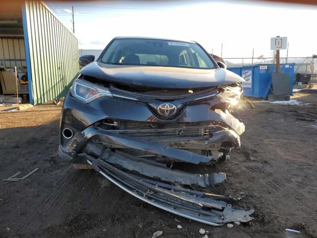 Photo 5 from auction – 2018 TOYOTA RAV4 with VIN 2T3RFREV9JW791043