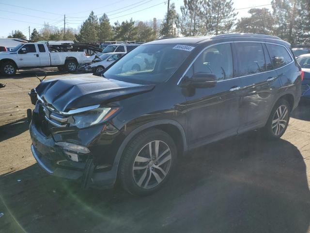HONDA PILOT ELIT 2017 with VIN 5FNYF6H00HB015099 - Photo from auction
