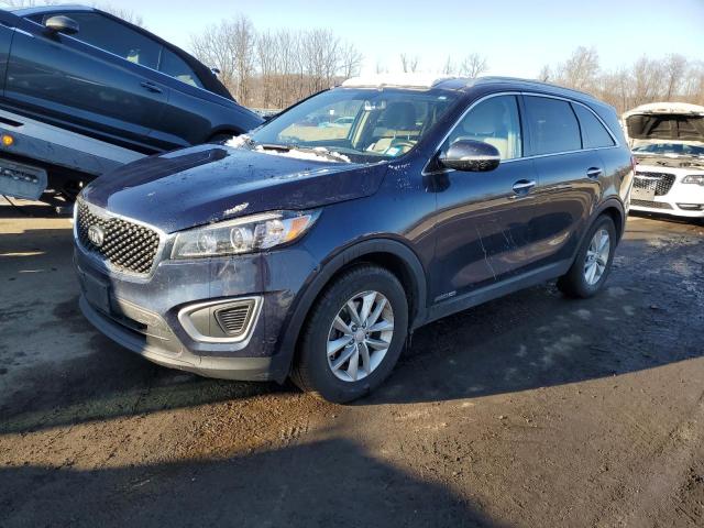 KIA SORENTO LX 2017 with VIN 5XYPGDA53HG198512 - Photo from auction